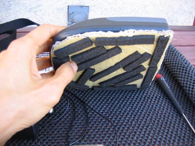 Years ago, I modified the CD-3470 (above right) for improved audio fidelity by applying rope caulk or adhesive tacky putty inside, beneath and in the battery compartment of the unit's chassis. I also made an isolation stand using a sheet of cardboard and foam strips.